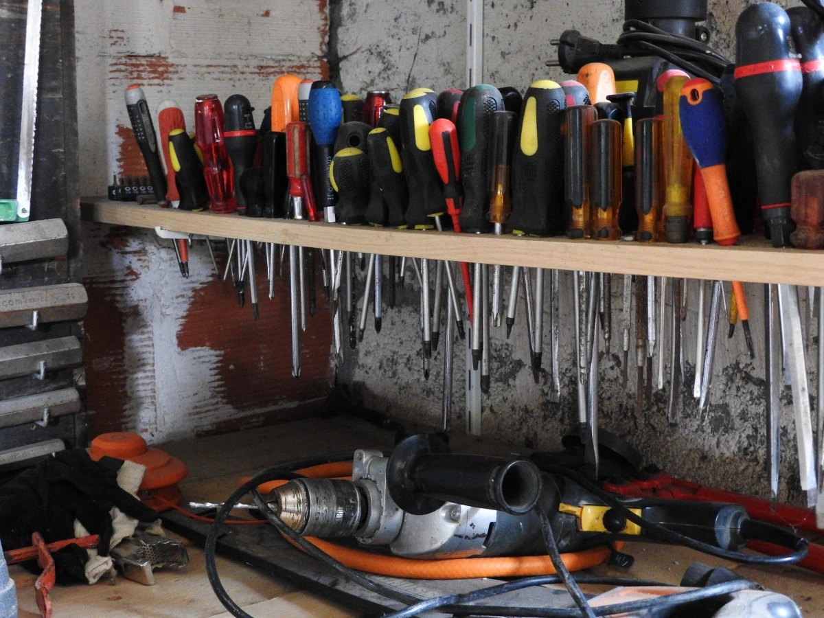 Organized collection of essential hand tools for beginner DIY enthusiasts
